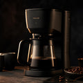 Matte black batch coffee brewer with glass carafe